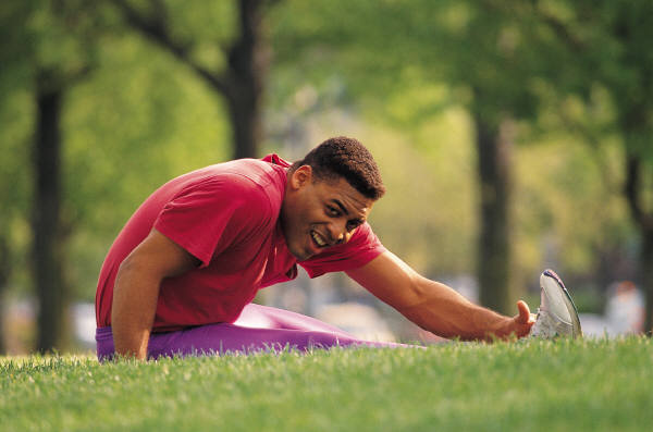 Man stretching in Park