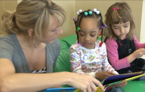 class reading to girls